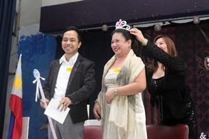 Foreign University International School Manila Philippines - Ms Annabelle Lesaca of Southville awarding the Prom King and Queen